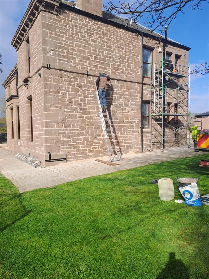 Chimney and lintel repair on a Scottish stone building