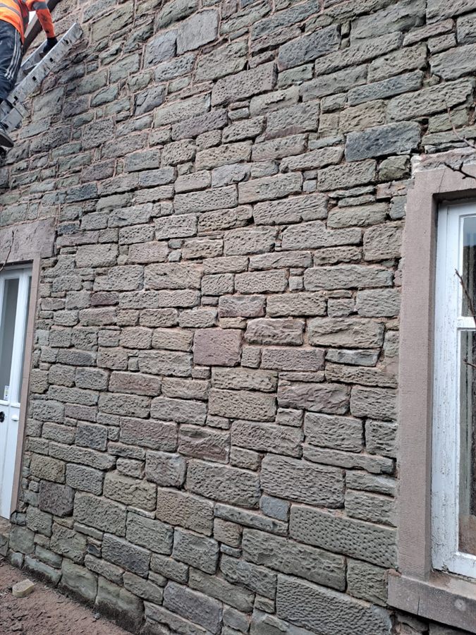Traditional lime pointing on a Scottish stone wall